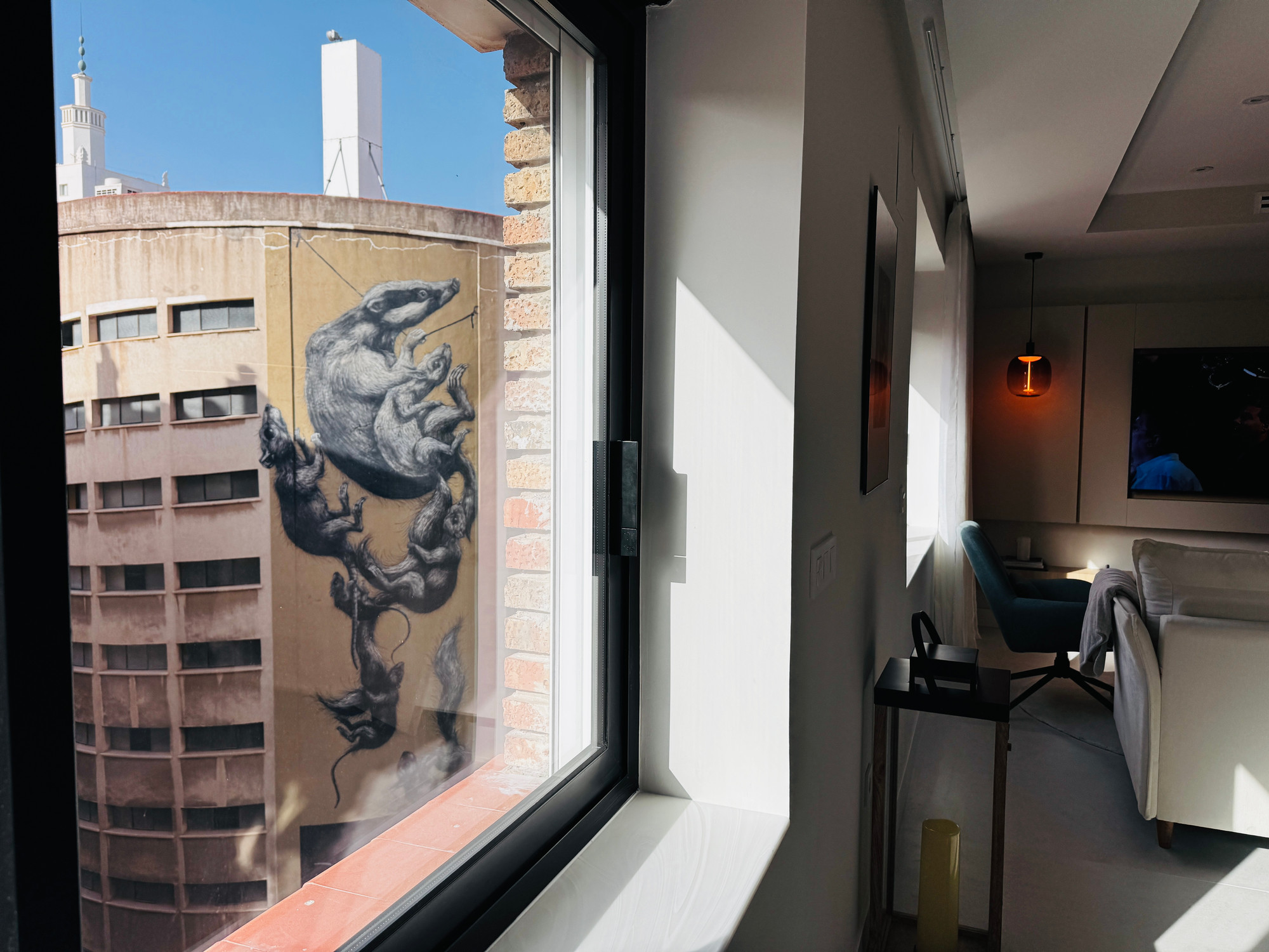 View from the residence window toward ROA’s animal mural across the street
